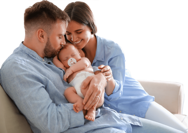 Parents holding their happy newborn baby, smiling together